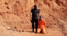 한 수단 기독교인을 살해하는 IS(이슬람국가) (포토 : 출처 = 동영상 캡처)